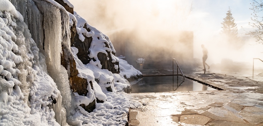 Winter scenery of Forest lagoon in Akureyri with icicles and steamy water / Copyright: Visit North Iceland